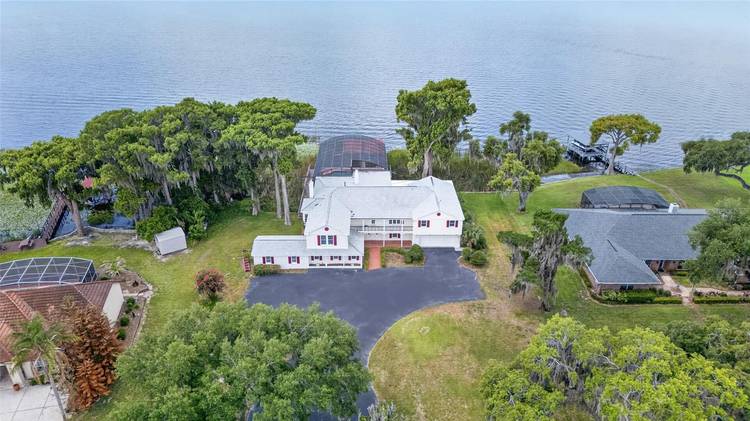 Experience the rare opportunity to own a historic lakefront estate on the coveted Lake Harris Chain of Lakes.