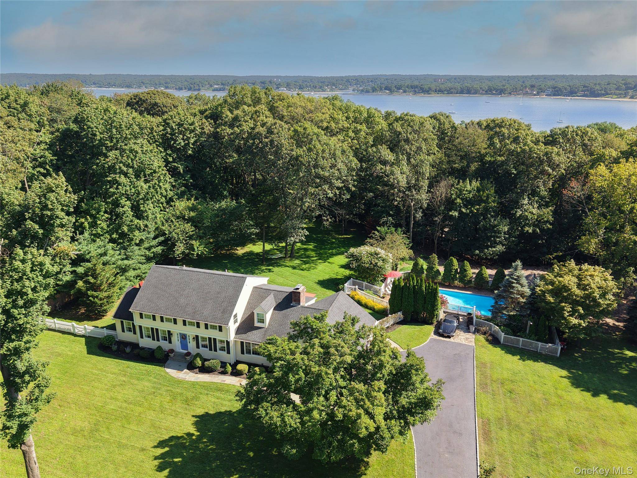 Welcome to Hawk Hill, one of Lloyd Harbor s most sought after neighborhoods, offering both beach and boat mooring rights, quiet tree lined roads, and spacious two acre parcels surrounded ...