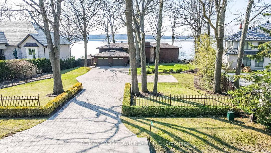 Immerse yourself in true waterfront luxury along one of Barrie's most prestigious and sought after streets, surrounded by multi million dollar estates on the shores of Kempenfelt Bay.
