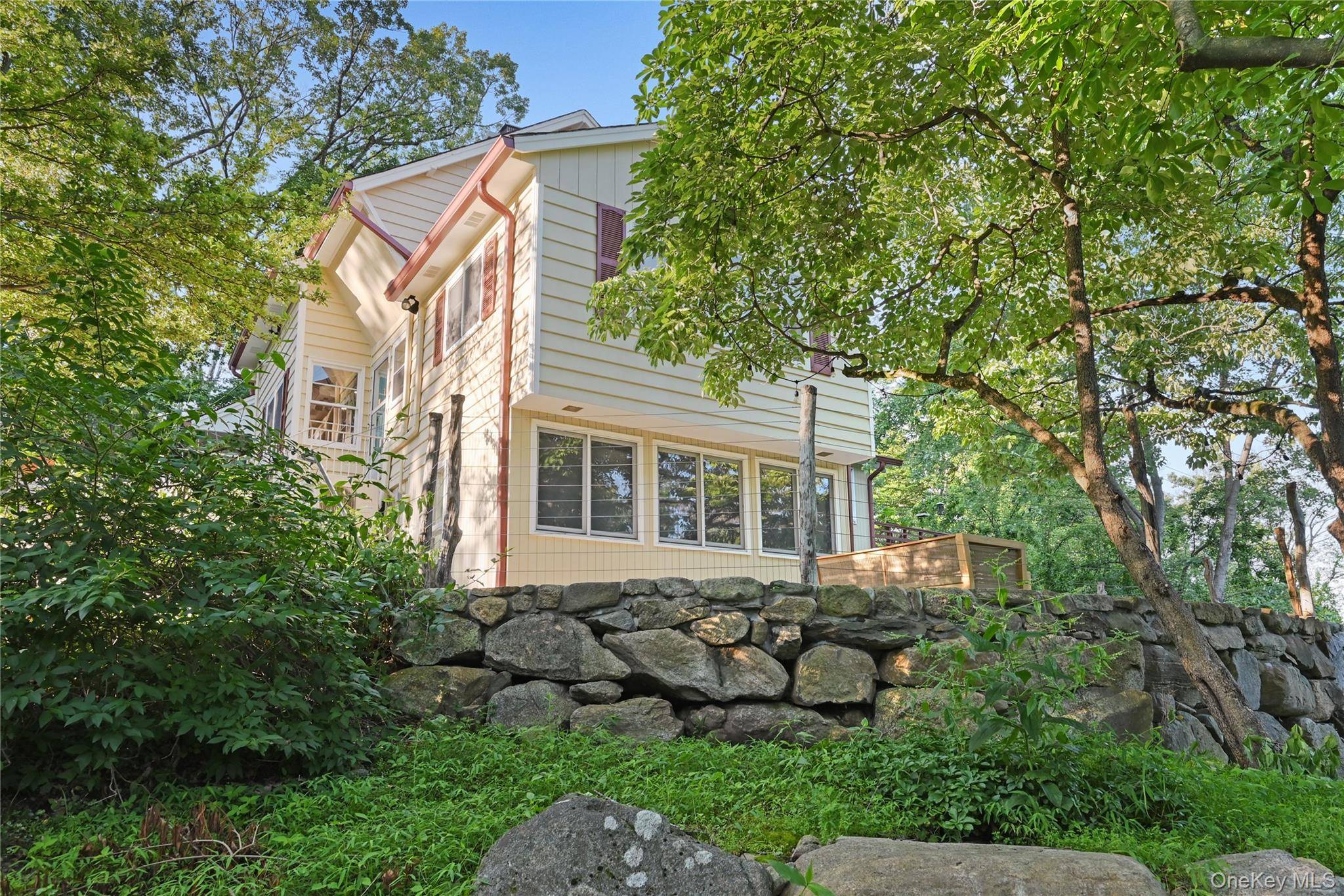 See Majestic Orchard Home Where Manhattan Meets Country Living A blend of charm and elegance, nestled among fruit bearing trees.