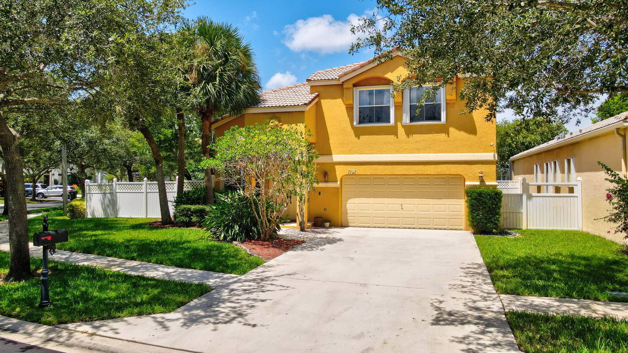 Welcome to this beautifully maintained corner property in the highly sought after Smith Farm Community.
