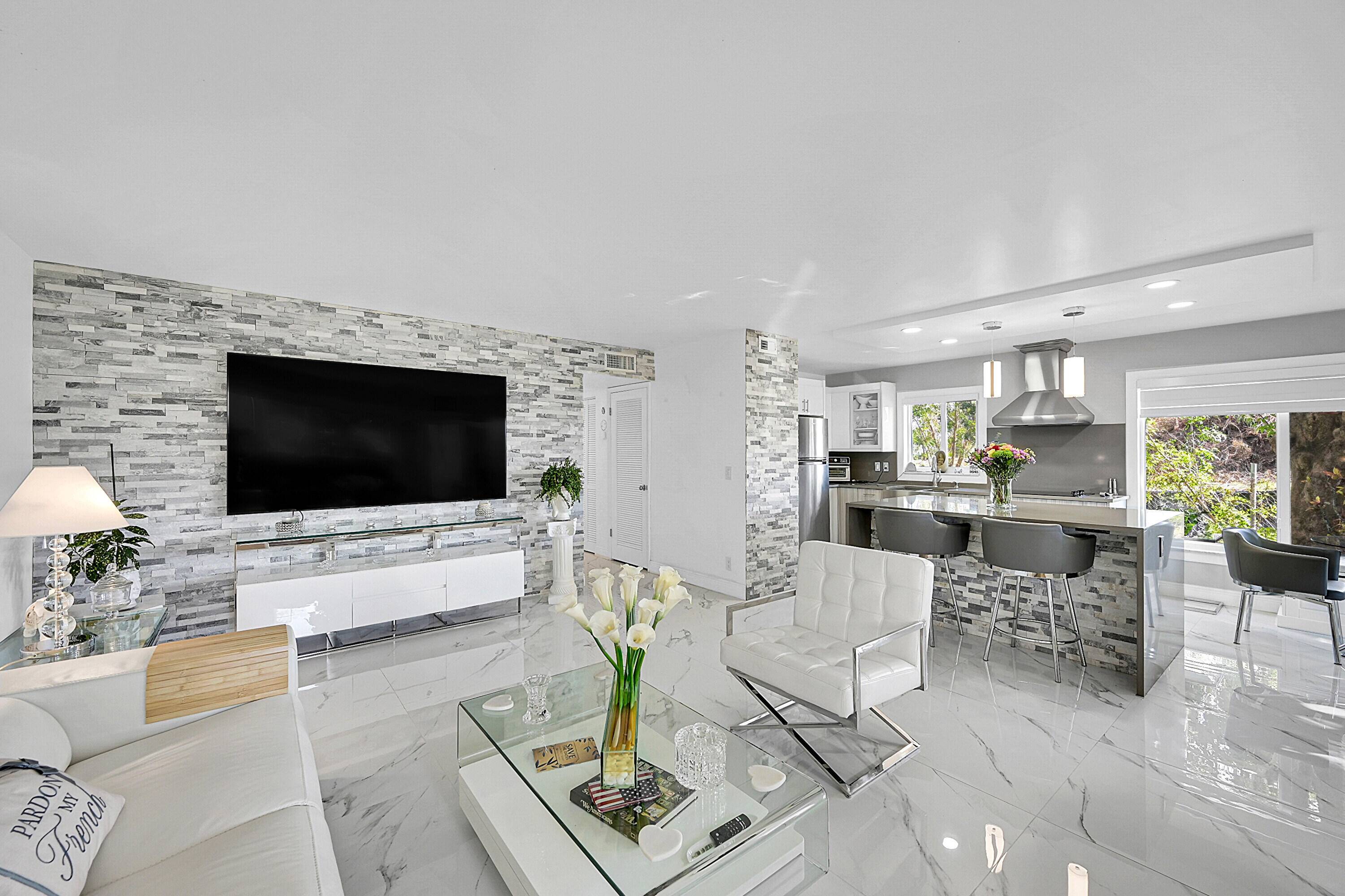 This beautifully renovated FURNISHED TURNKEY 2 bedroom, 2 bathroom corner unit just under 1200 sq ft in the highly sought after Greenbrier building offers privacy, natural light, and modern upgrades ...