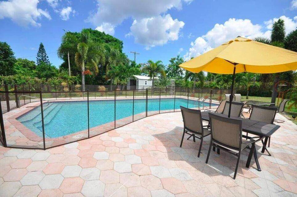 Available June 1st ! Welcome to 272 NW 45th Street, a beautifully renovated 4 bedroom, 2 bathroom single family home located in the highly desirable East Boca Raton area.