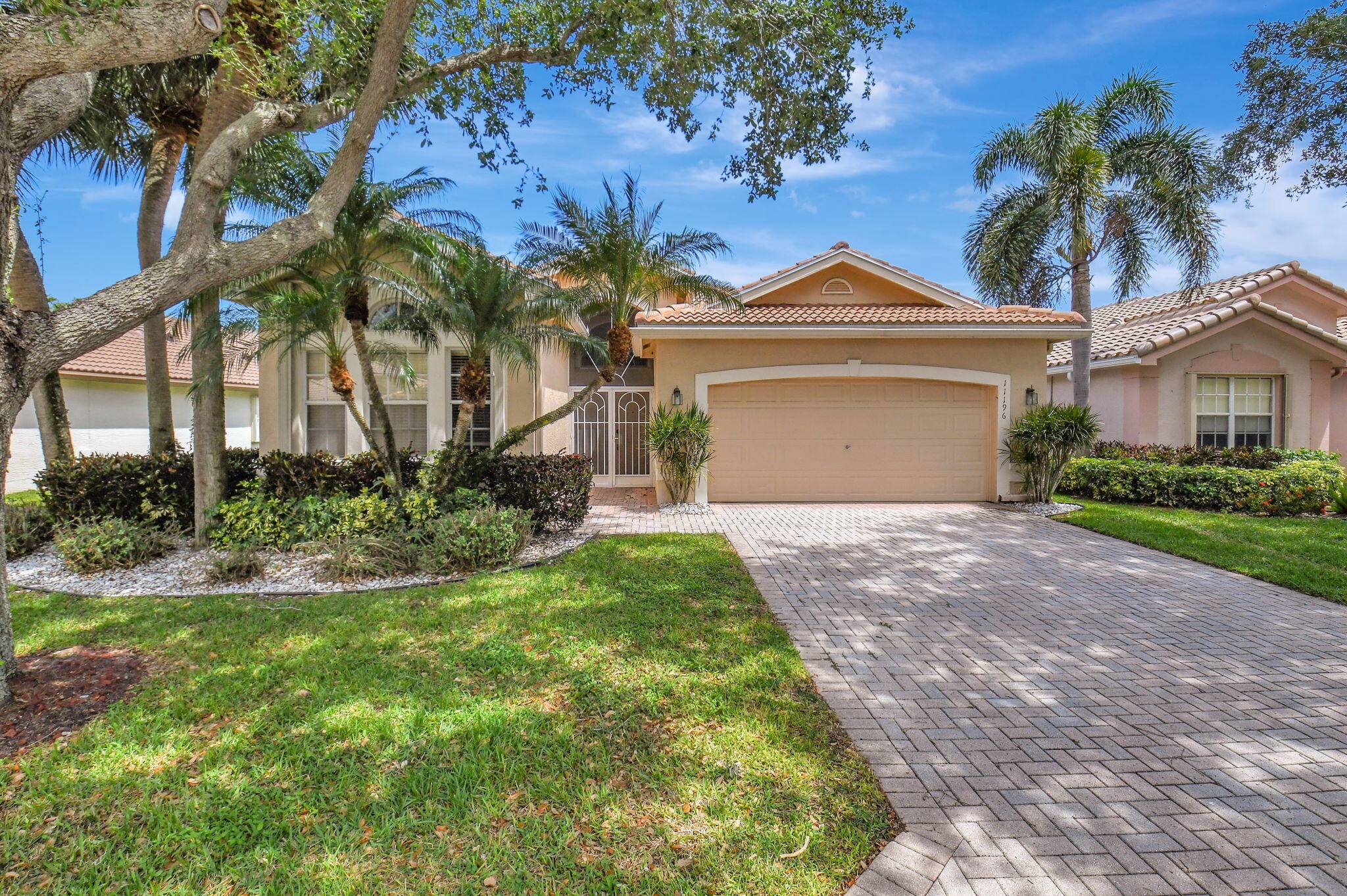 Welcome home to Valencia Isles, highly desirable 55 plus active adult community that is pet friendly.
