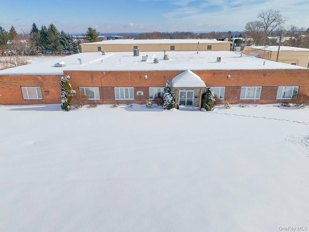 Position your business for success at 54 56 Central Avenue, a highly visible commercial property located in the center of Ravena's business district.