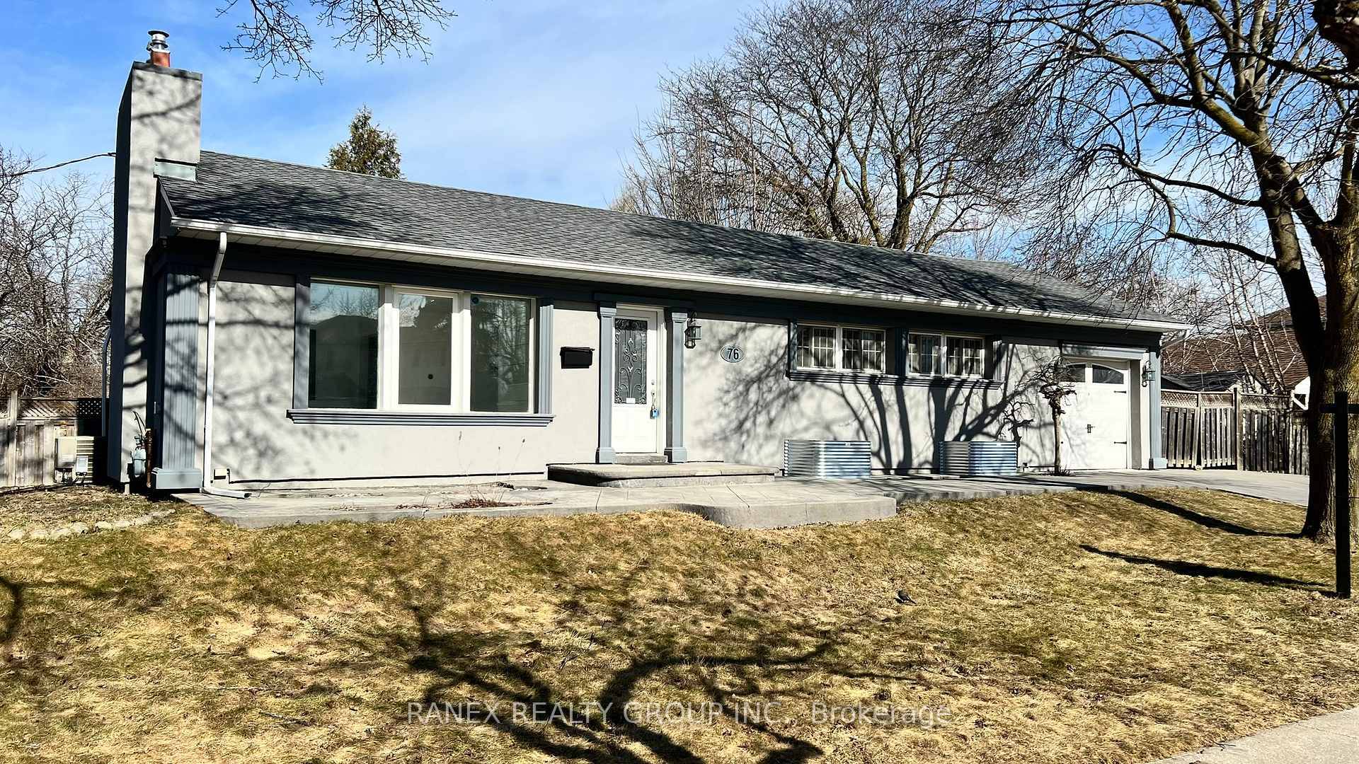 Great Corner Lot Bungalow Located in a Quiet Peel Village with modern Stucco Exterior and Stamped concrete driveway and walkways witch gives this home a beautiful curb appeal and modern ...