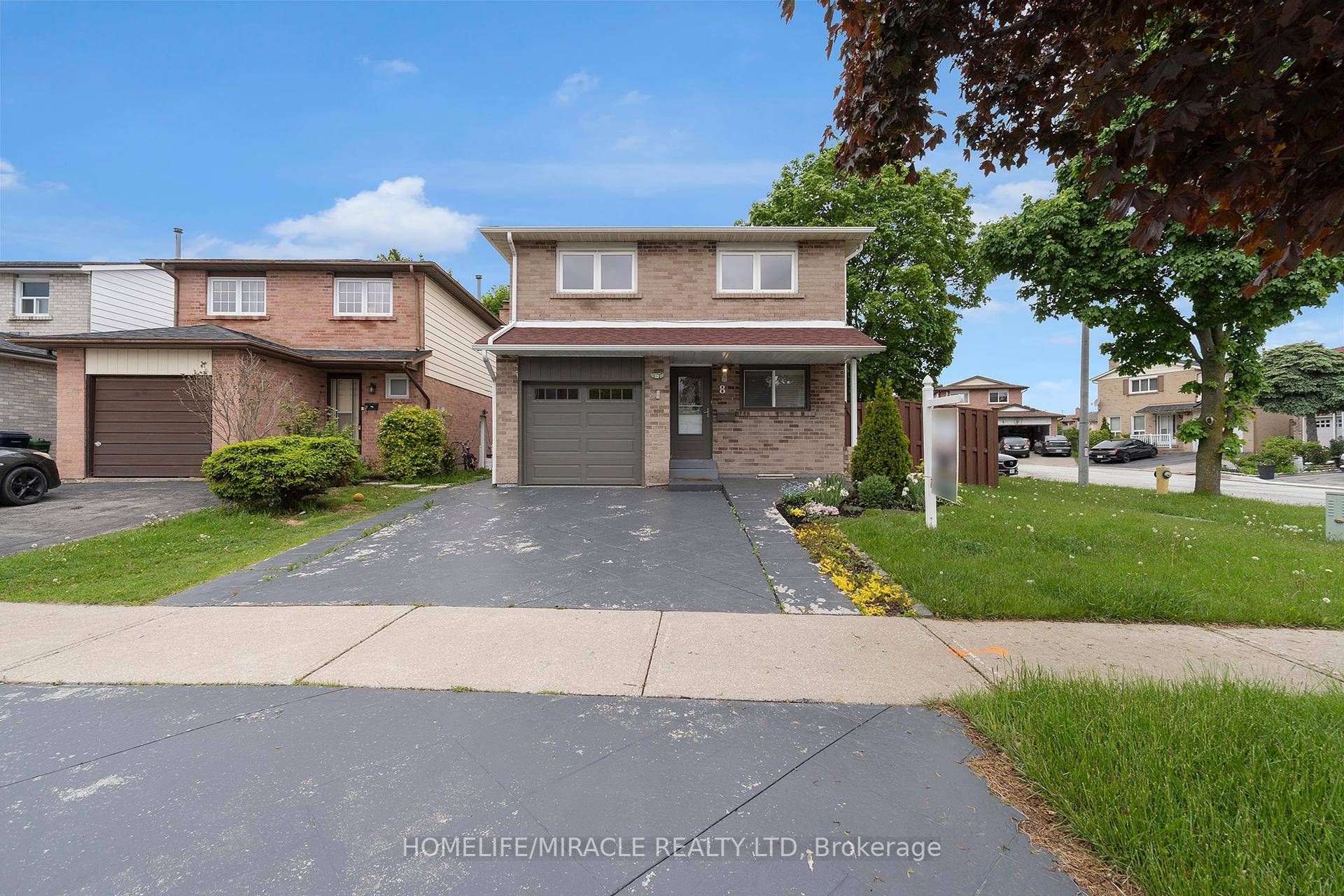 Welcome to this beautifully maintained, upgraded corner lot detached home !