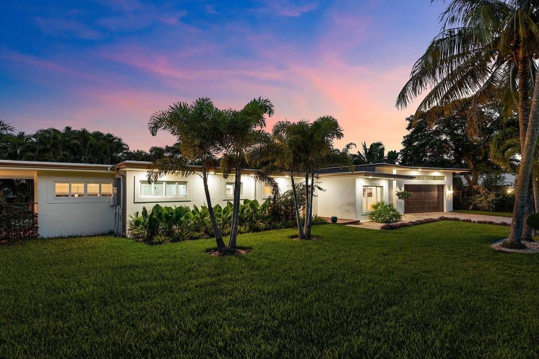 Tucked away on an oversized lot in the heart of Delray Beach's beloved Lake Ida neighborhood, 400 Kings Lynn is a stunning example of Mid Century Modern design reimagined for ...
