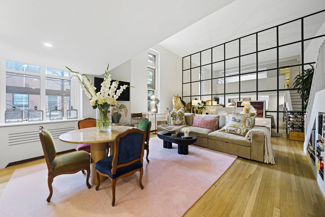 This rare loft style one two bedroom residence combines Parisian elegance with downtown grandeur.