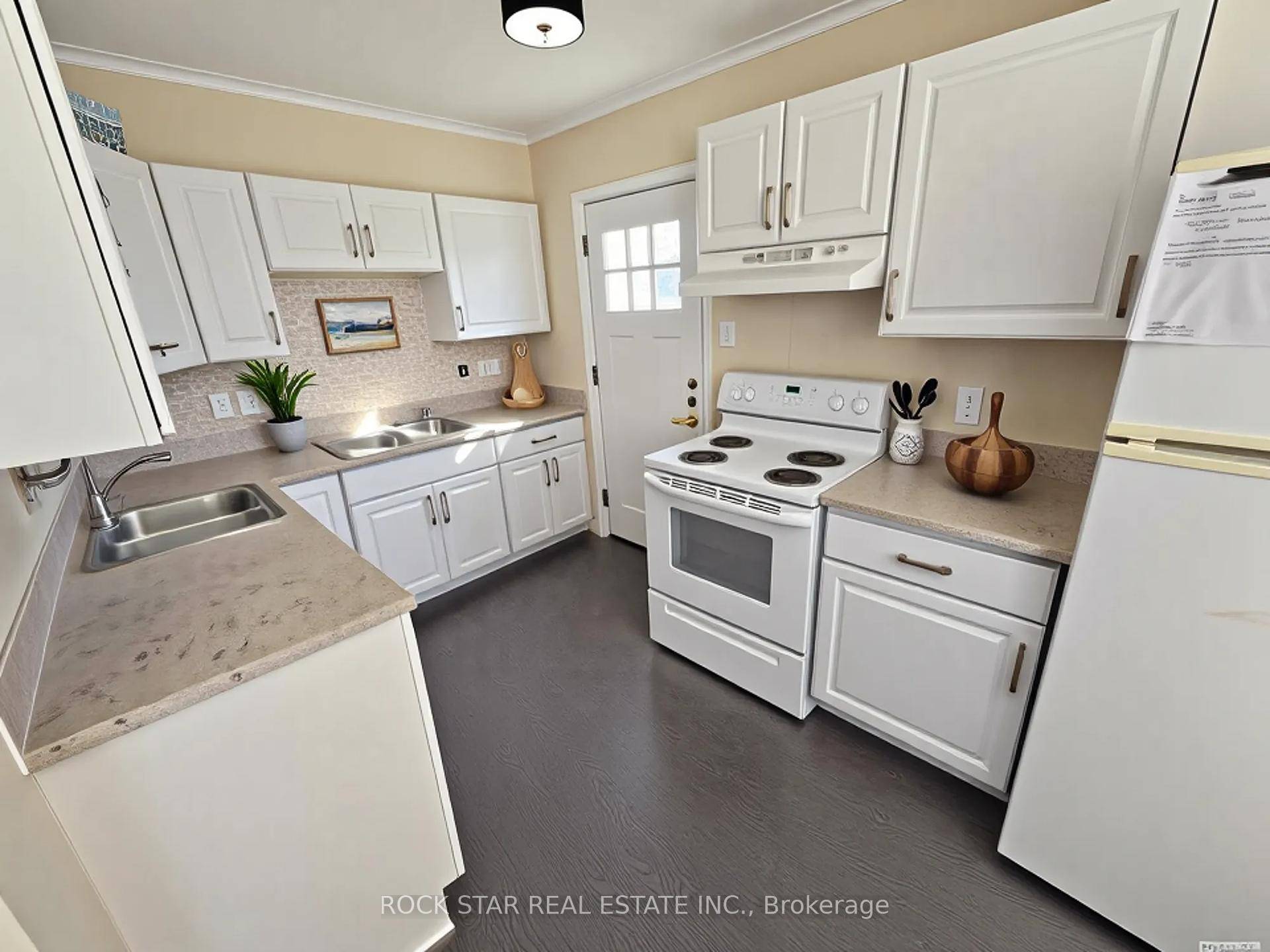 Attention investors ! Excellent, turn key, cash flowing, licensed rental property with 2 self contained units.