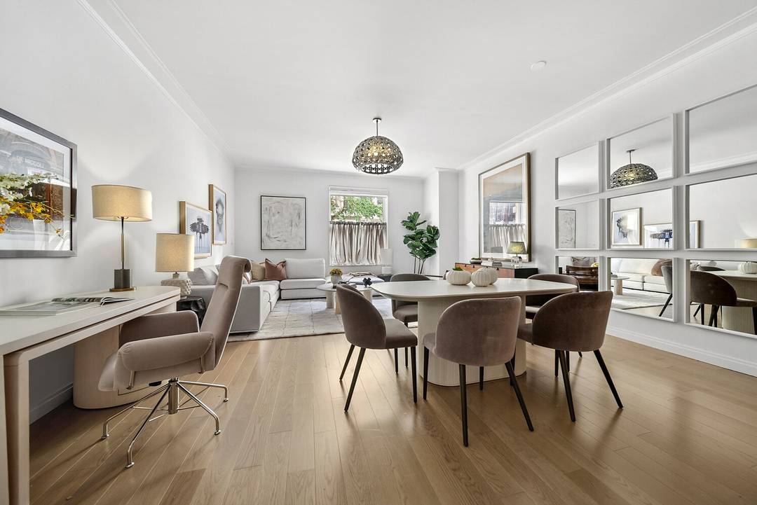 With 10' ceilings in the great room, one feels a sense of Edwardian grandeur throughout this oversized three bedroom duplex home.