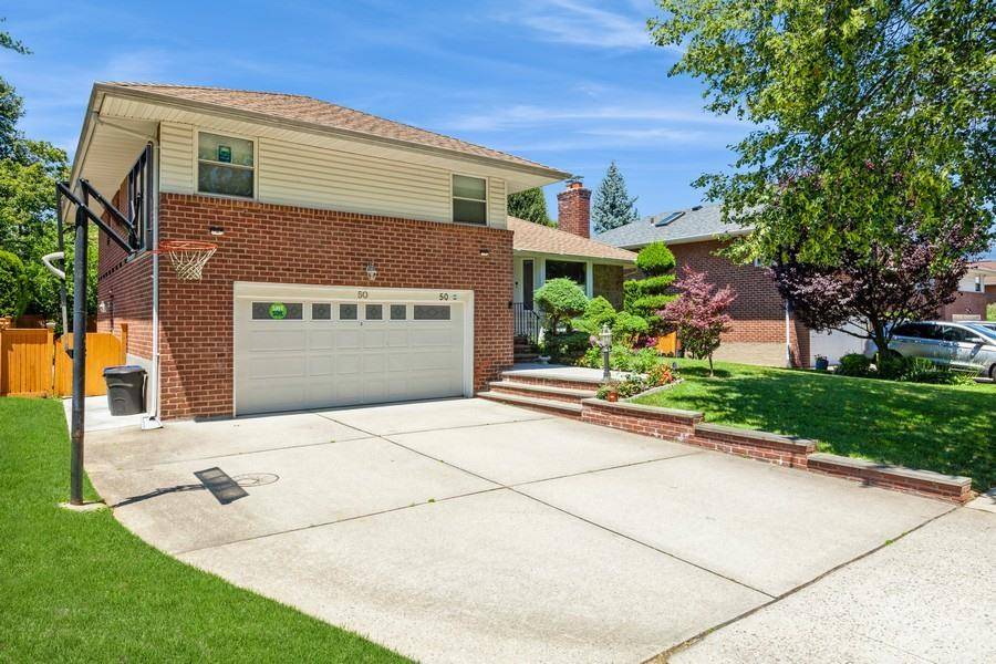 ? ? Welcome to 50 Edgewood Drive Your Perfect Forever Home in the Hericks School District Nestled in the heart of New Hyde Park, this beautifully maintained 3 bedroom, 2.