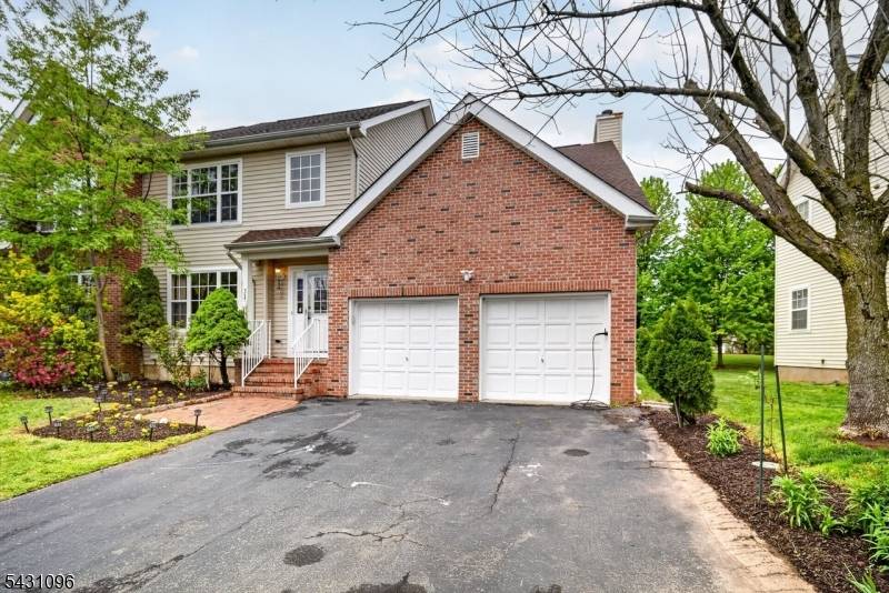 Desirable Chadwick II model updated East facing duplex located in one of the best locations in the development, backing to open space for exceptional privacy views.