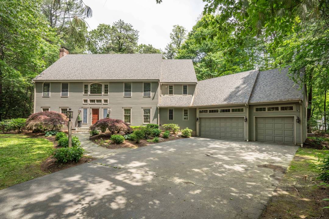 This spacious home is beautifully situated at the end of a cul de sac in the popular Devonwood neighborhood of Farmington.