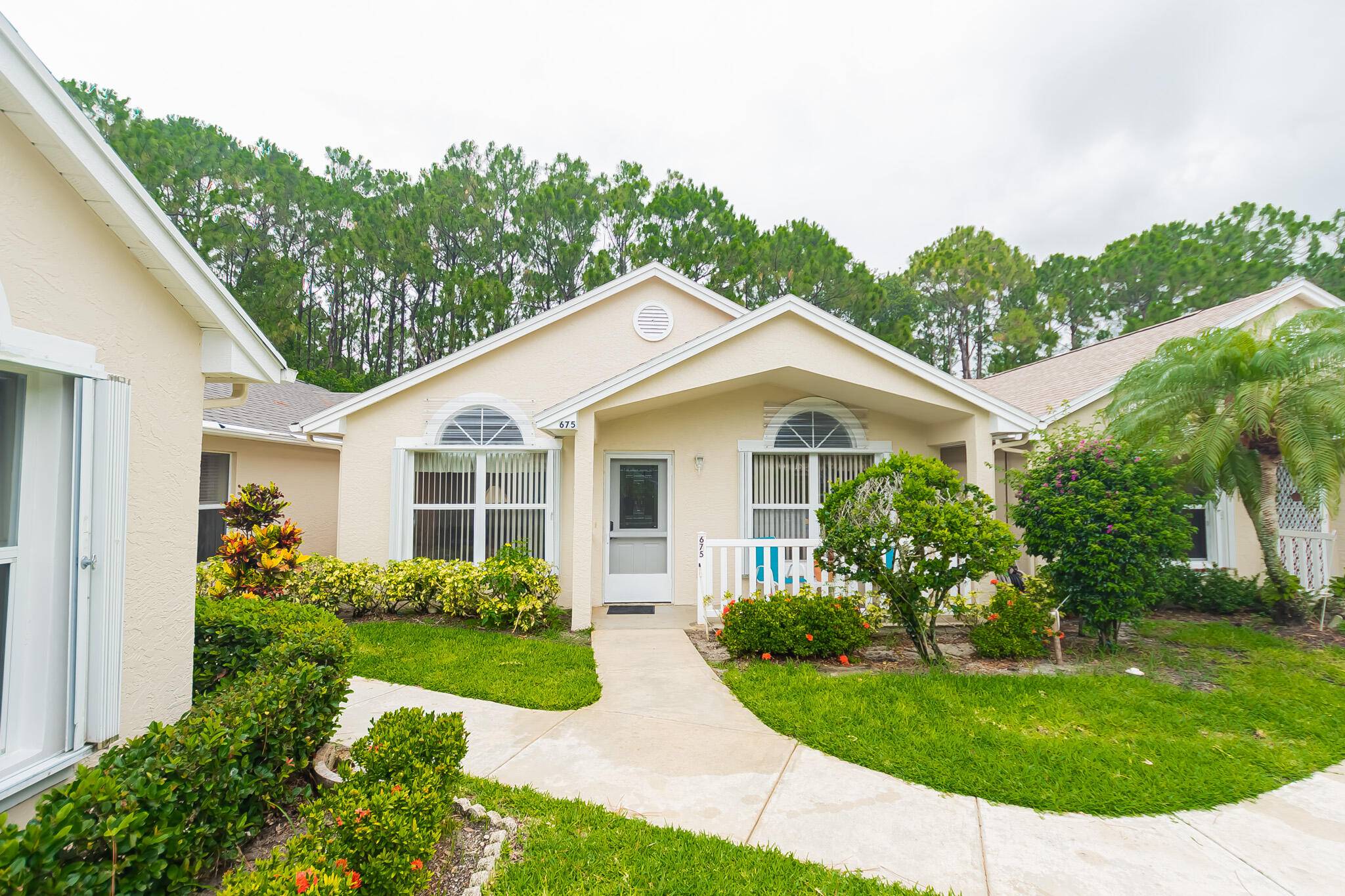 Enjoy easy living in this beautifully maintained 2 bedroom, 2 bath villa in Kings Isle, Isle of Venice an active 55 gated community in the heart of St.