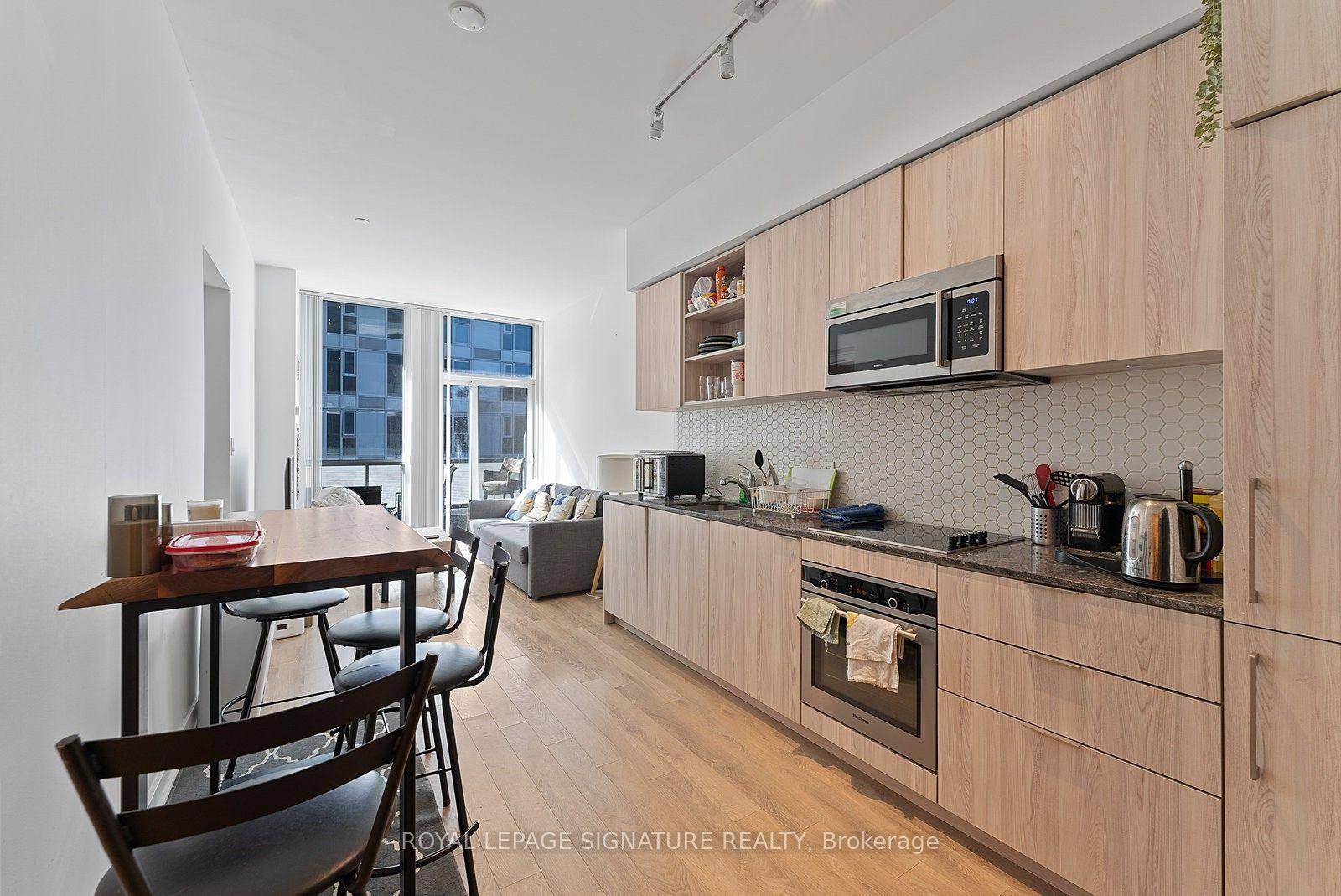 Loft Style 2 1 Bed 2 Bath Suite with Parking at Playground Condos !