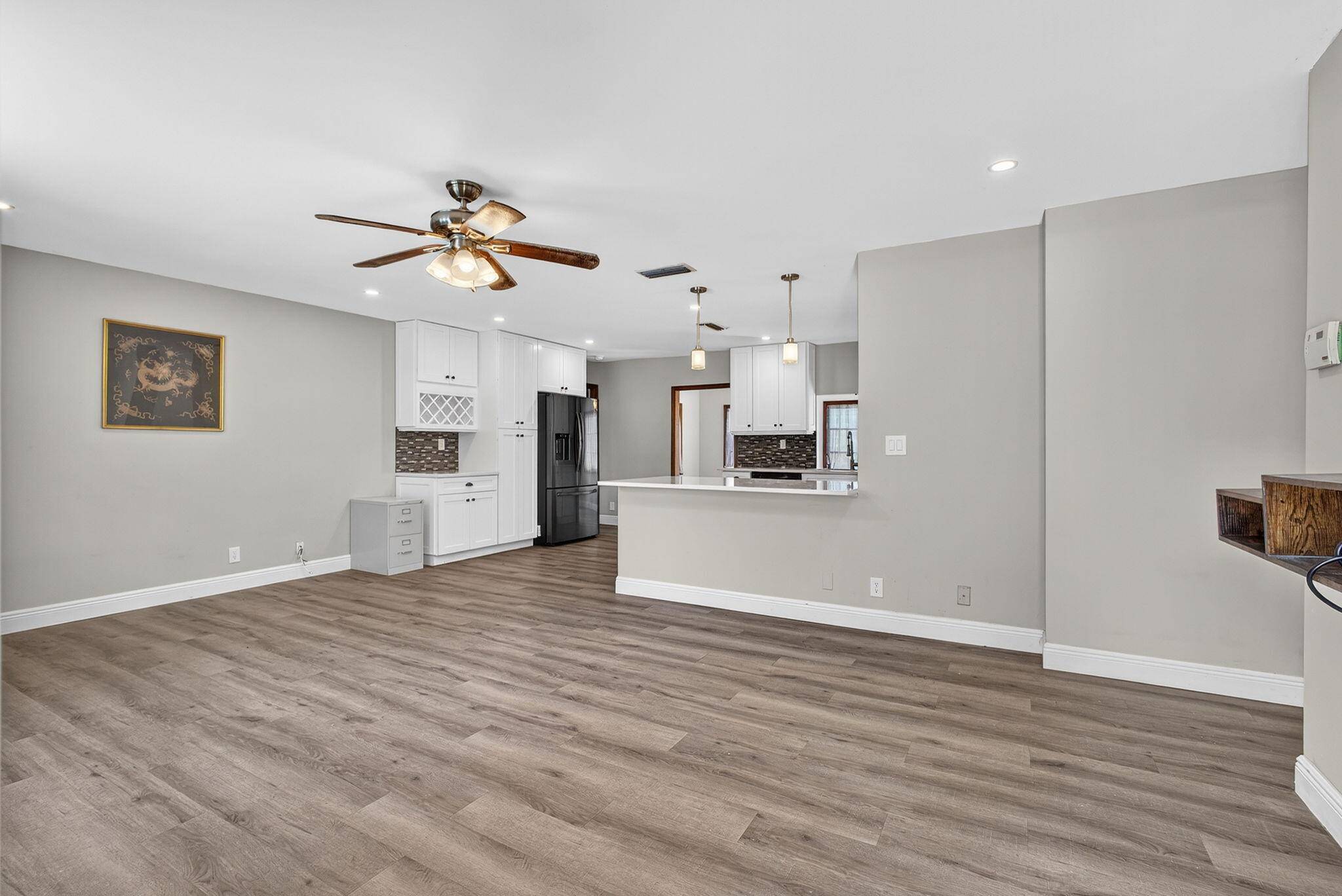 Welcome to this beautifully remodeled 3 bedroom, 2 bathroom home that blends modern design with comfort and functionality.