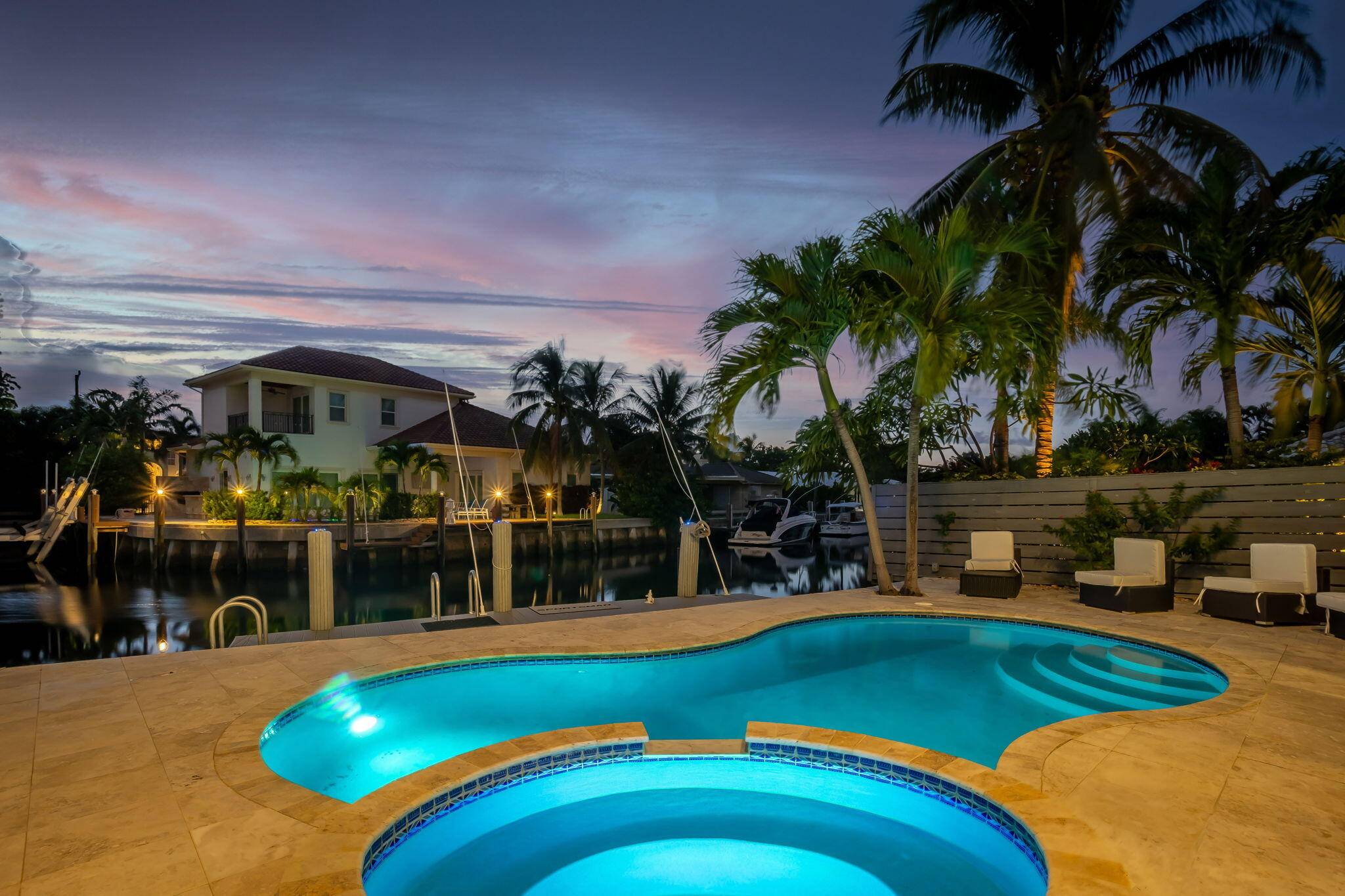 Experience the epitome of luxury living with this spectacular waterfront home in East Boca Raton.