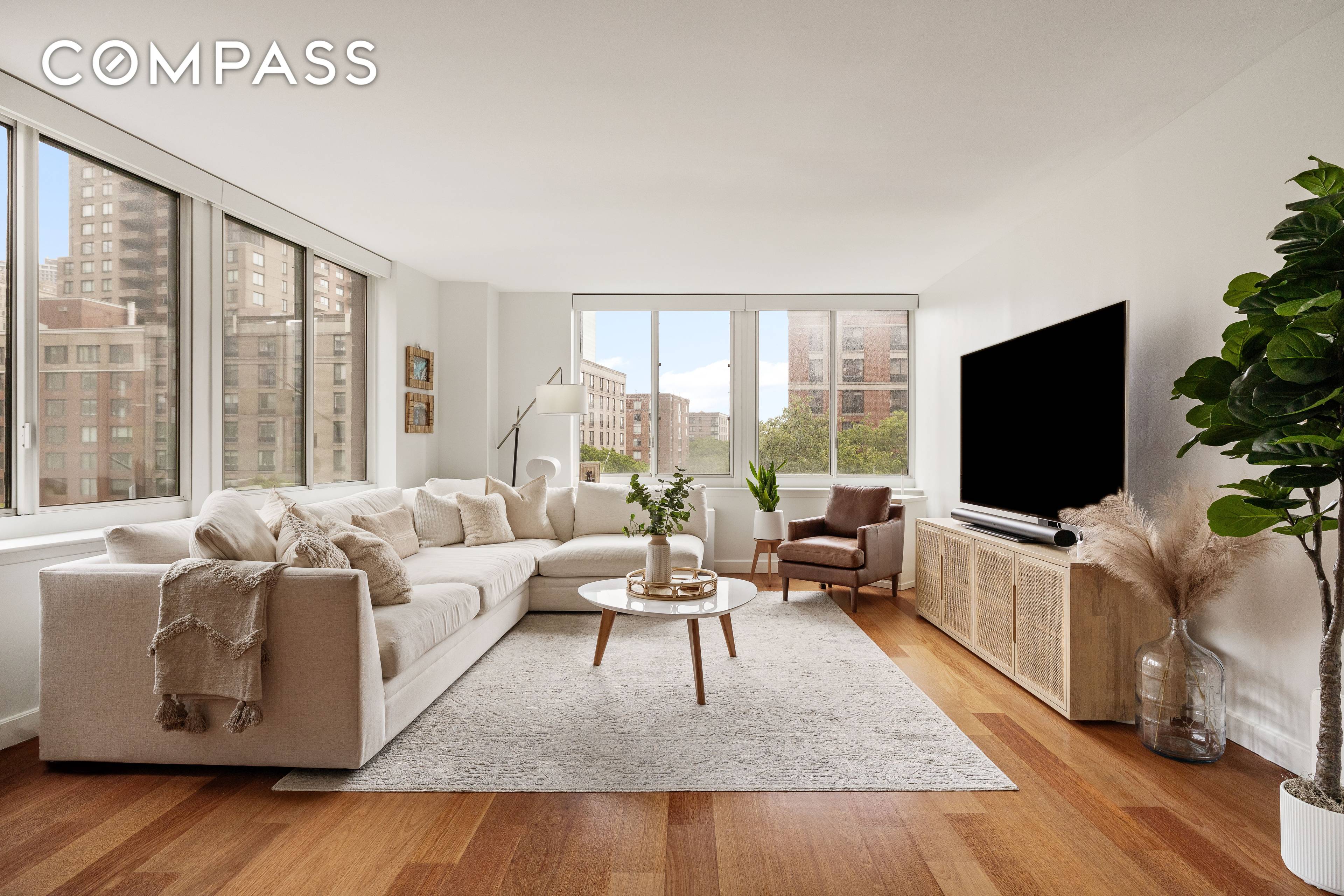 Experience refined urban living in this exceptional 2 bedroom, 2 bathroom corner sanctuary.