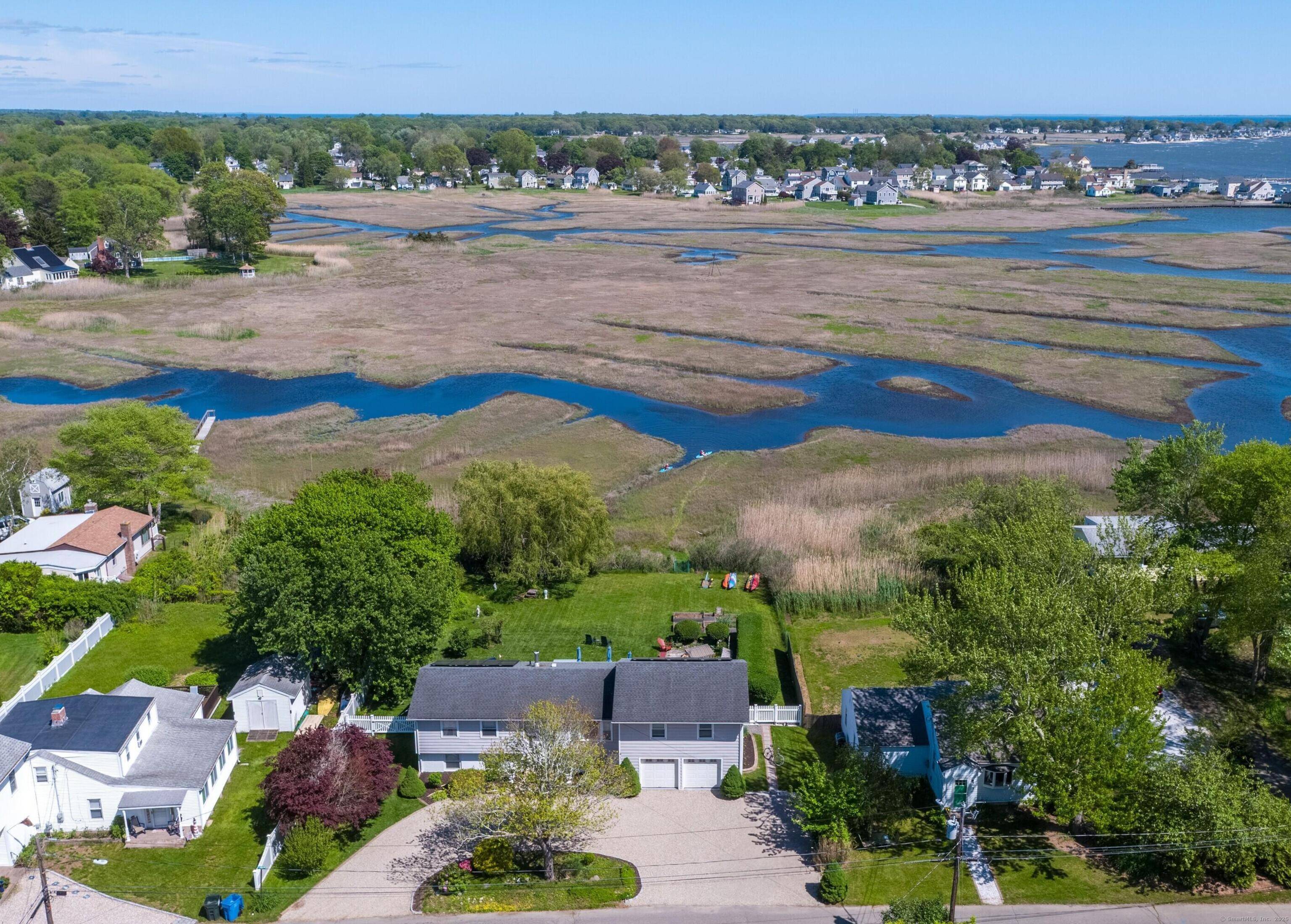 Imagine slipping your kayak into the tidal waters of Hagar Creek from your spacious backyard, and gliding through the morning's sun dappled marsh to find yourself entering Long Island Sound.