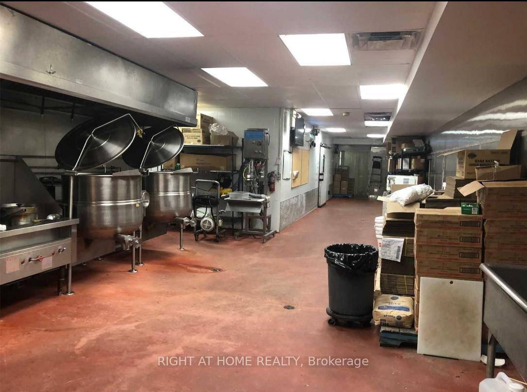 Ghost Kitchen. There is sinks, kitchen hood, Large walk in Cooler amp ; Freezer and Loading Dock.