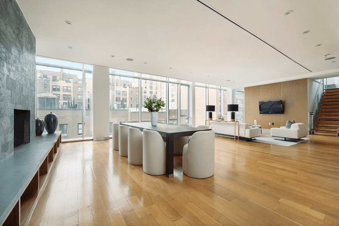 This TRIPLEX PENTHOUSE located on the Upper East Side in a private full service CONDO building is something to be seen.