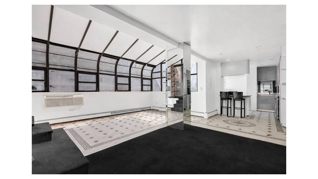 Offered well under 700 per square foot, this Sutton Place CONDO provides a unique opportunity to create the industrial chic penthouse of your dreams !