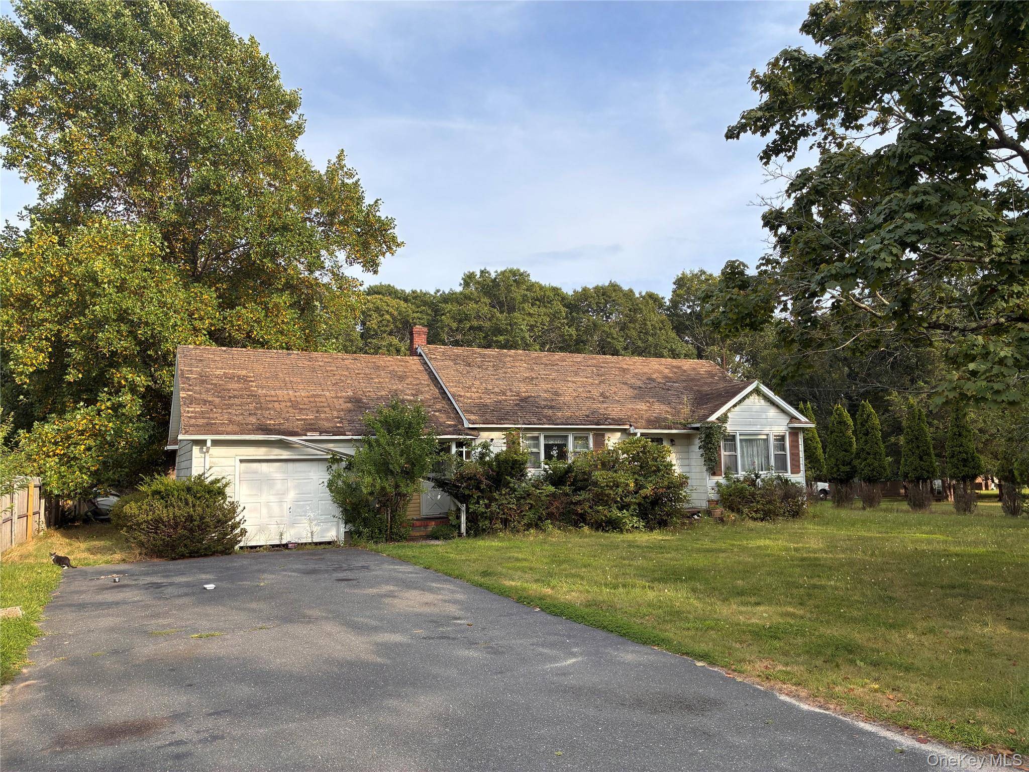 Located just shy of a half acre, this 2 bedroom, 1 bath ranch offers the perfect canvas for your vision.
