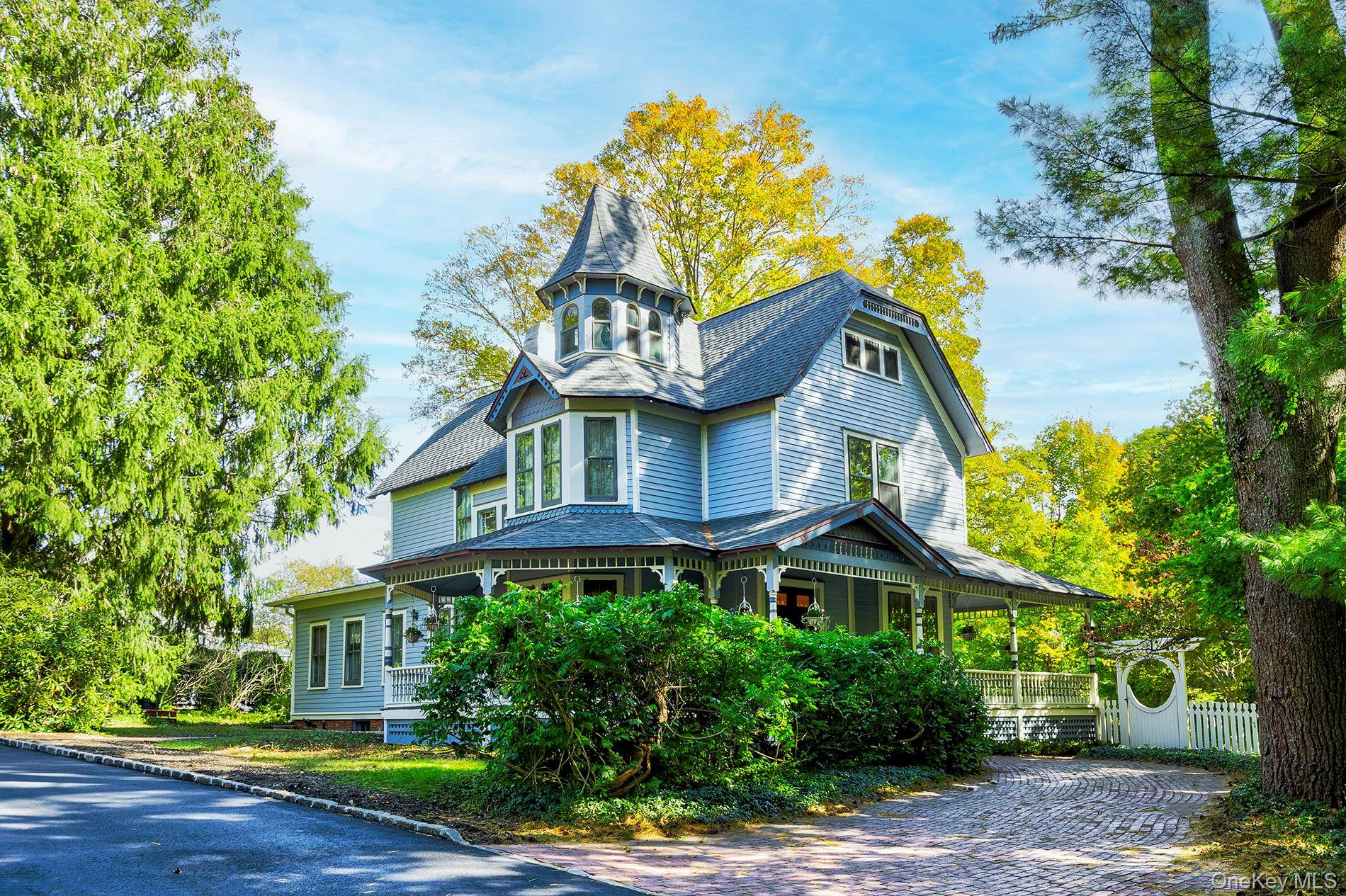 Step into timeless elegance at 150 Ocean Avenue, Northport, a Queen Anne Victorian designed by renowned architect George F.