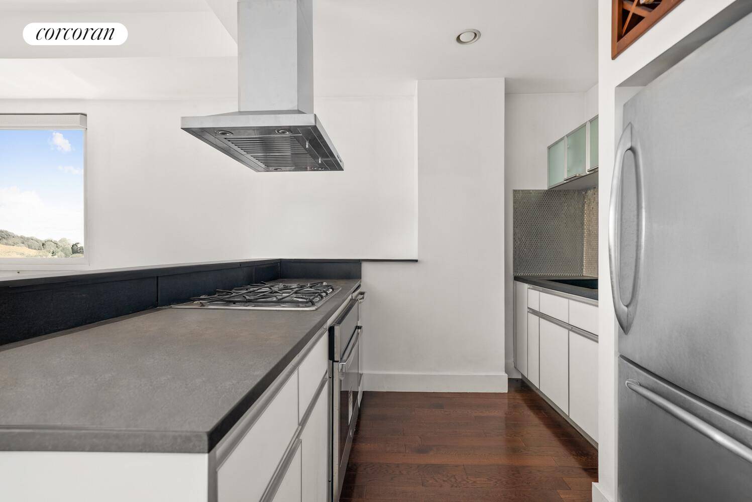 Welcome to this 525 sf studio with windowed sleeping alcove home office at 44 27 Purves Street This well laid out studio offers approximately 525 square feet of interior space, ...