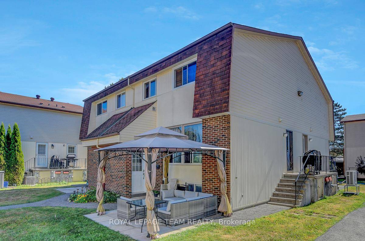 Corner unit townhome offering bright living spaces, thoughtful updates, parking right at your doorstep amp ; close to Trans Canada Trail !