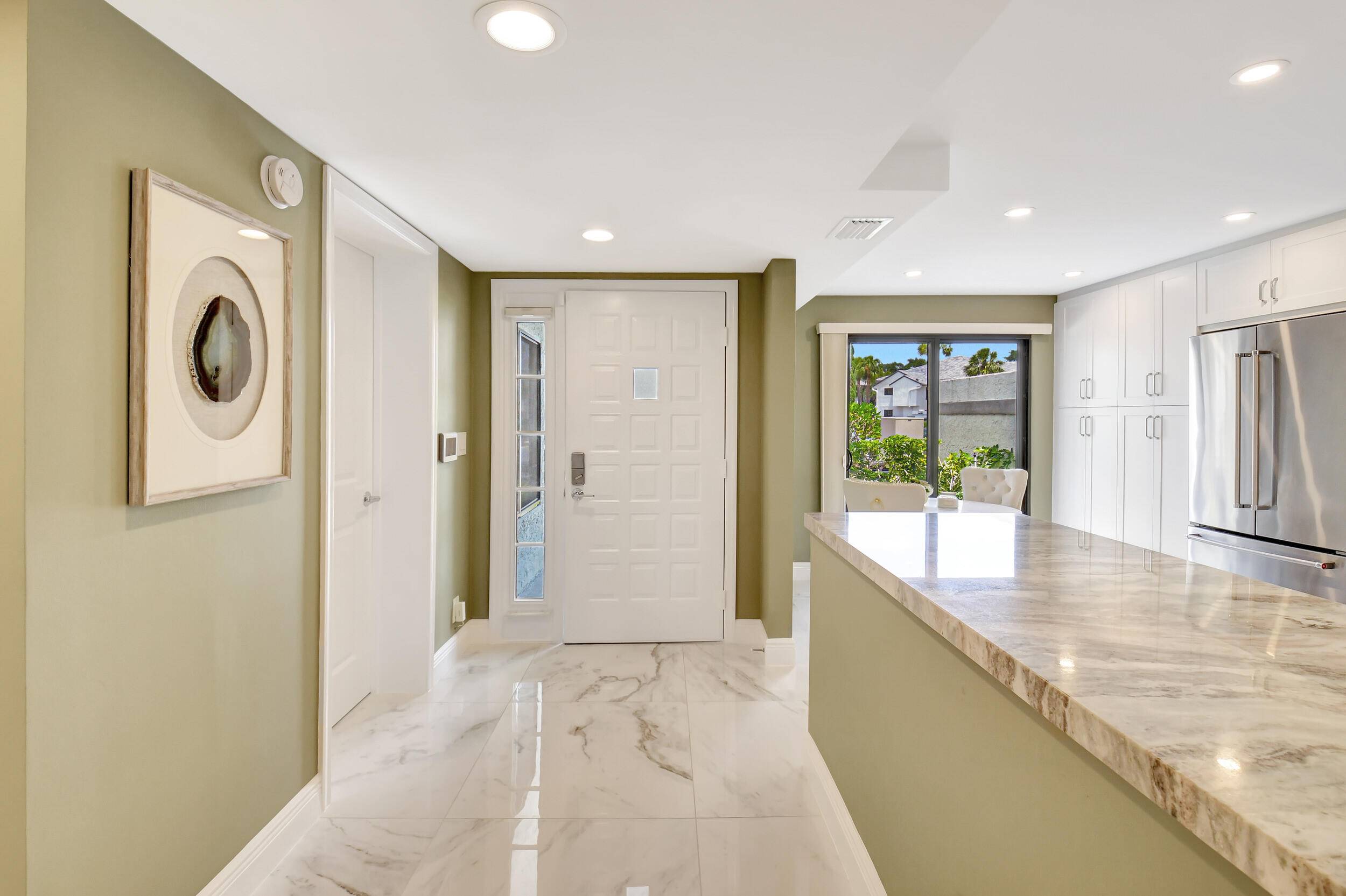 LOCATION, LOCATION, LOCATION this two bedroomtwo bath condo on the golf course, is only one block from the main club house or one block to the pool.