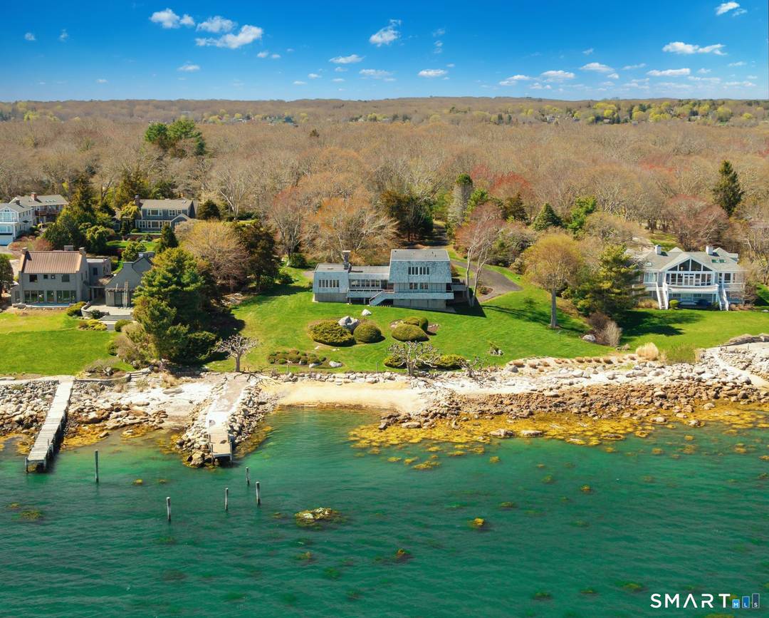 First time available in over 50 years, this generational waterfront estate on Masons Island presents an extraordinary coastal offering.