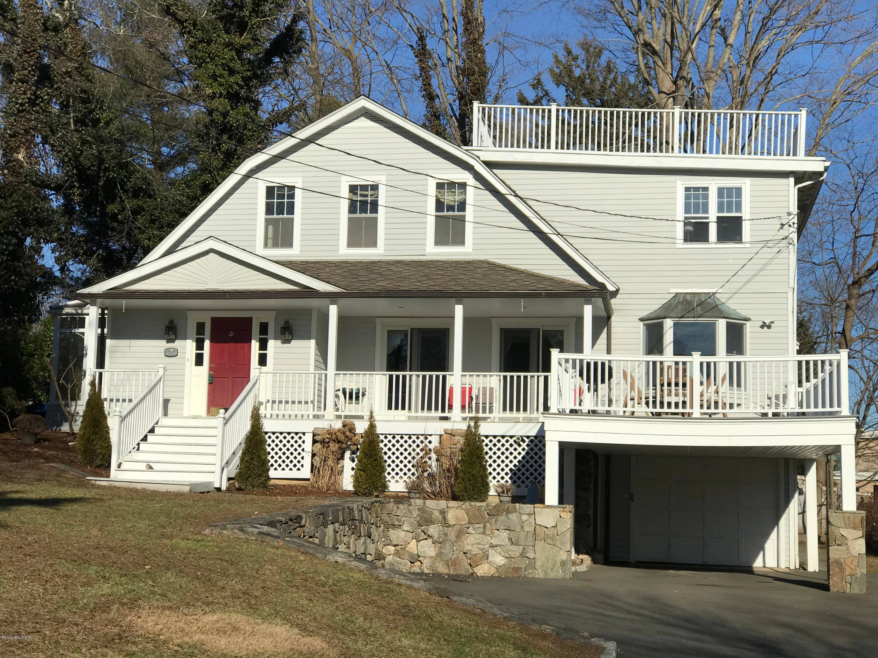 Beautiful Shore Colonial home located in the private Shorelands Association.