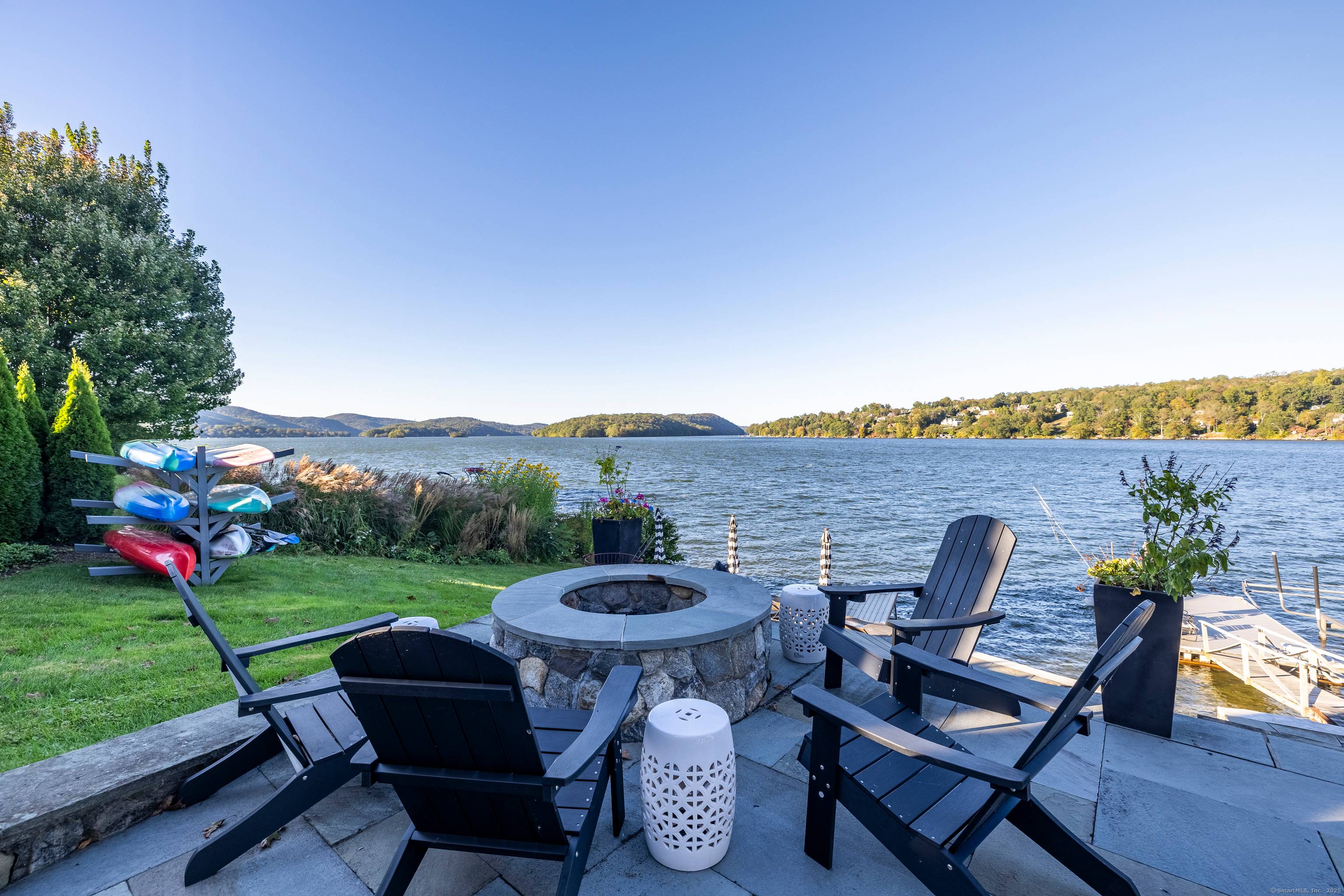 Offering 150ft of waterfront, this double lot with sweeping 180 degree views of Candlewood Lake is a must see property.