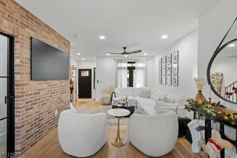 A Rare Single Family Offering With Backyard Roof Deck Multiple Floors of Modern Living.