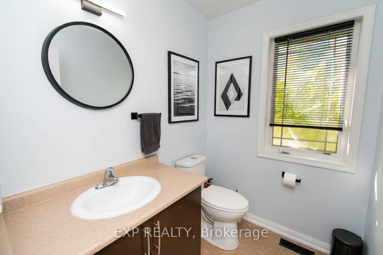 MOTIVATED SELLER ! This property offers an elevated walkout deck, a walkout basement and a practical side entrance from the garage.