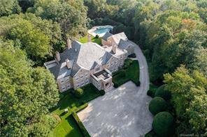 Classic elegance defines this extraordinary custom built Georgian Manor poised on 14 exceedingly private acres in coveted Conyers Farm featuring double gated entry, long winding drive, expansive stone terrace and ...