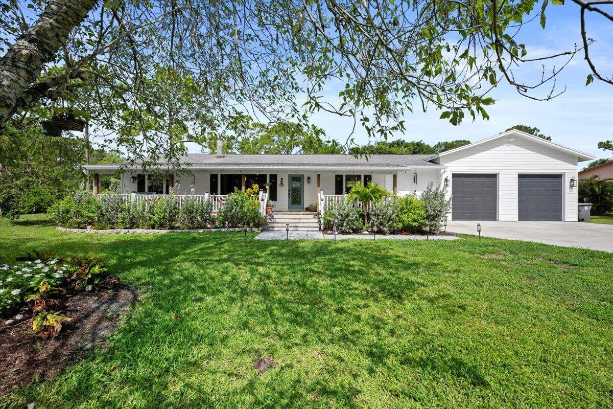 Welcome to your slice of paradise in sought after Jupiter Farms !