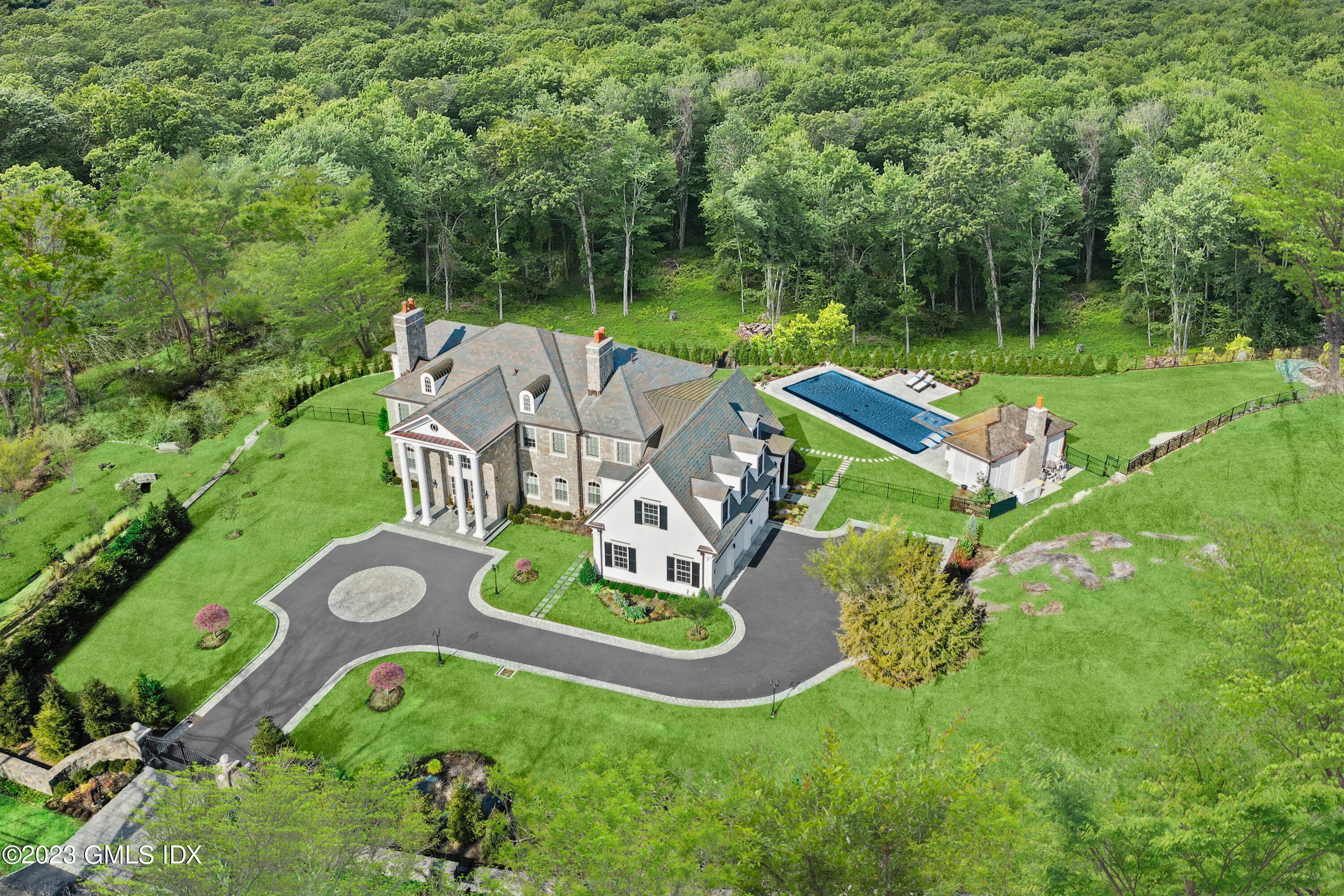 Extraordinary custom six bedroom Stone Cedar home graces 2.