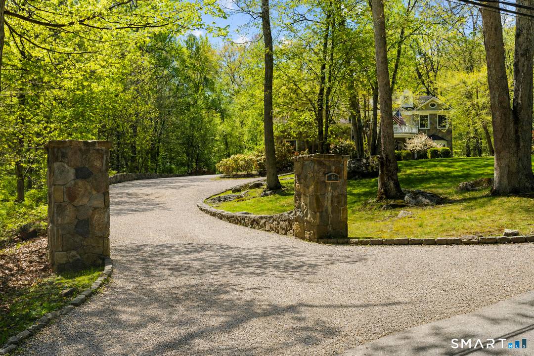 Beautifully rebuilt in 2006, this custom turn key retreat offers 4 spacious Bedrooms with the flexibility for a 5th, 3 full 2 half baths, all set on 2.
