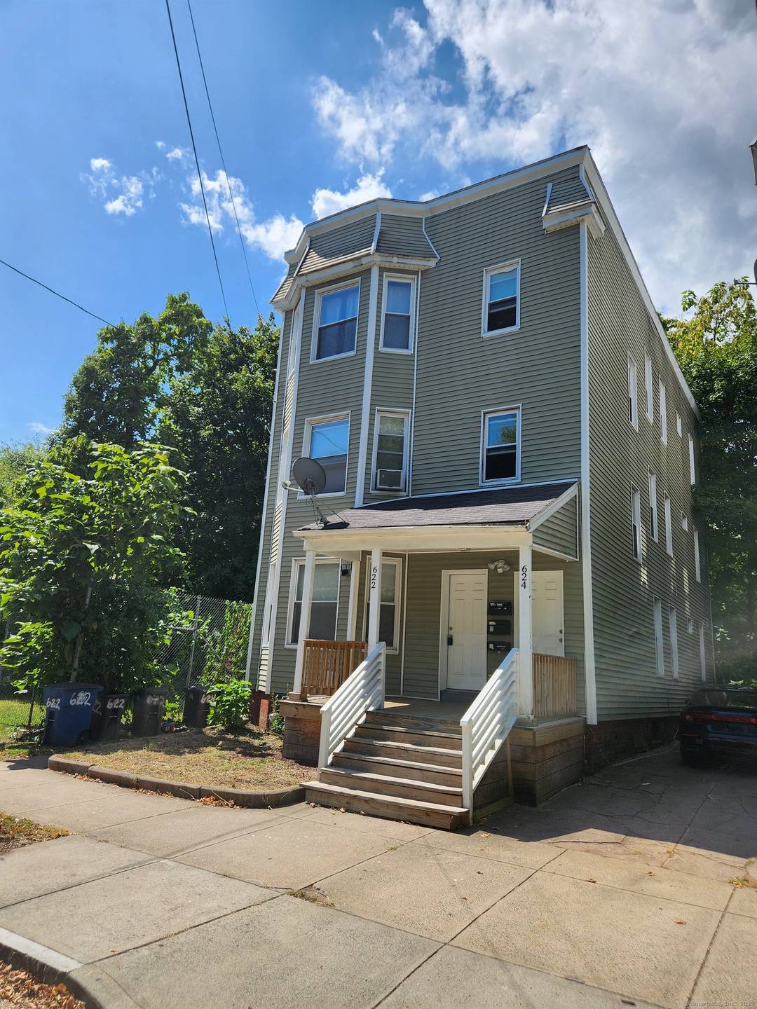 Recently renovated kitchens on the 1st and 2nd floors highlight this spacious three family property offering 3, 498 sq.
