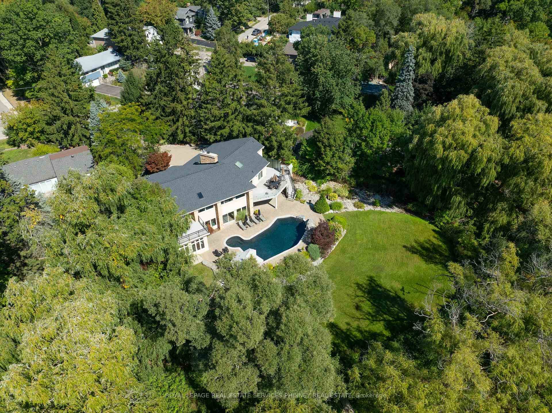 Don't miss your chance to own this extraordinary raised bungalow in the highly sought after Rattray Marsh community, where elegance meets nature.