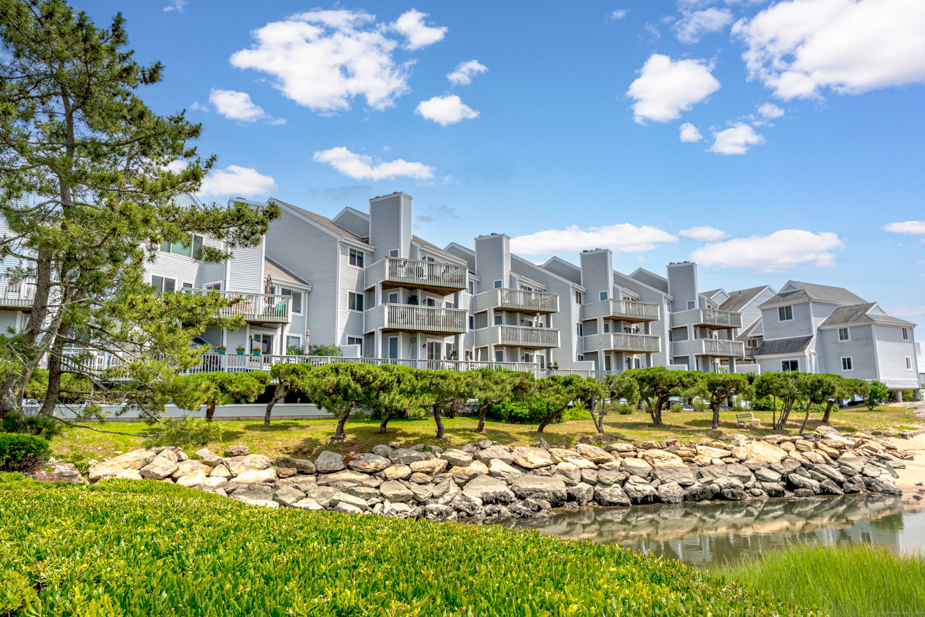 Direct views of Long Island Sound, Bradford Cove and salt marsh from this 2BR, 2Bath ranch unit.