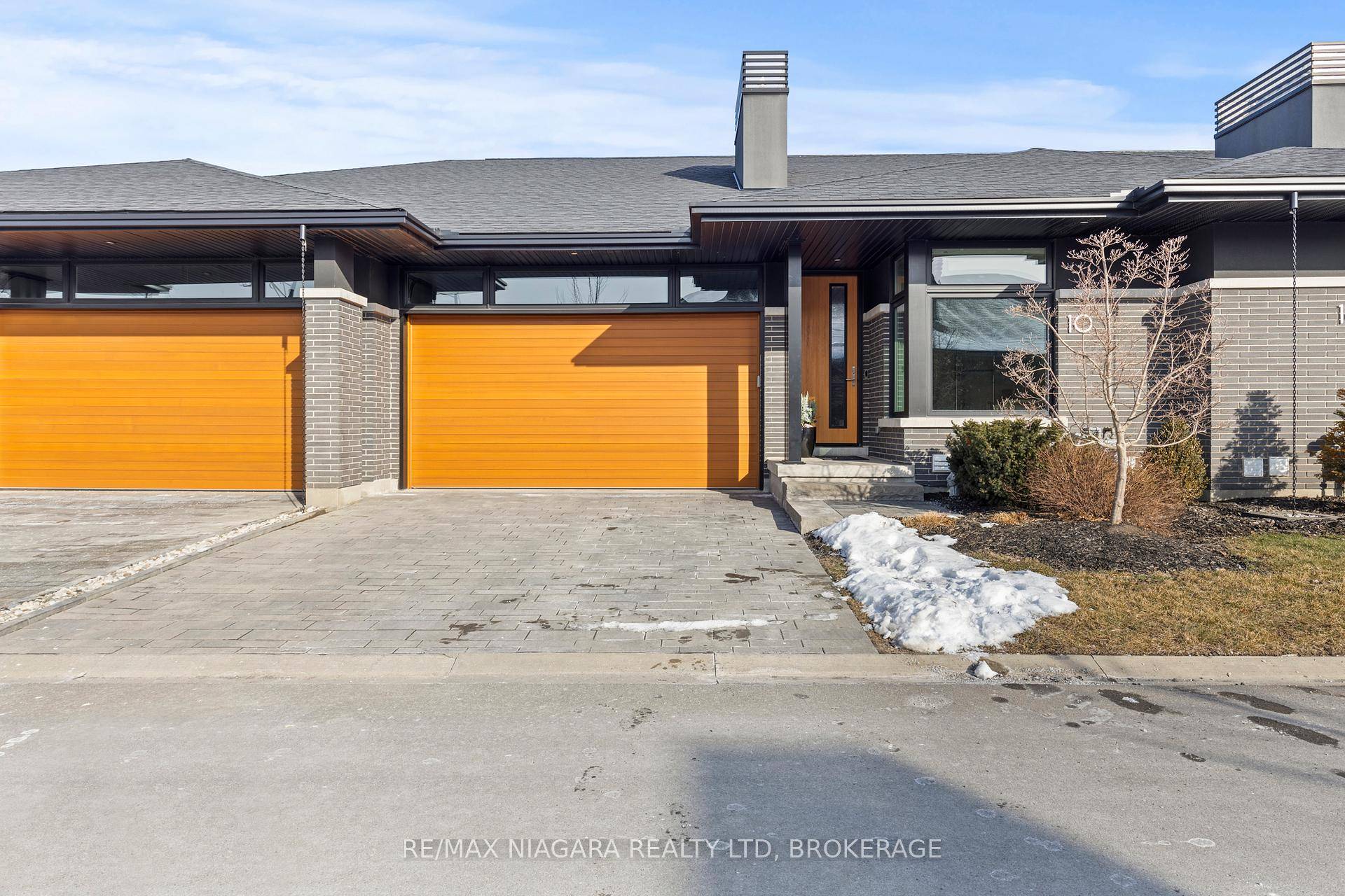 With undeniable curb appeal, this bungalow townhouse features NO REAR neighbours, a double car garage, a finished basement and is fully loaded inside with luxurious finishes.