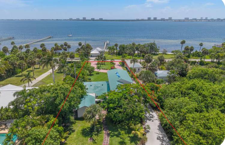 Stunning 3 acre waterfront estate on Indian River Drive !