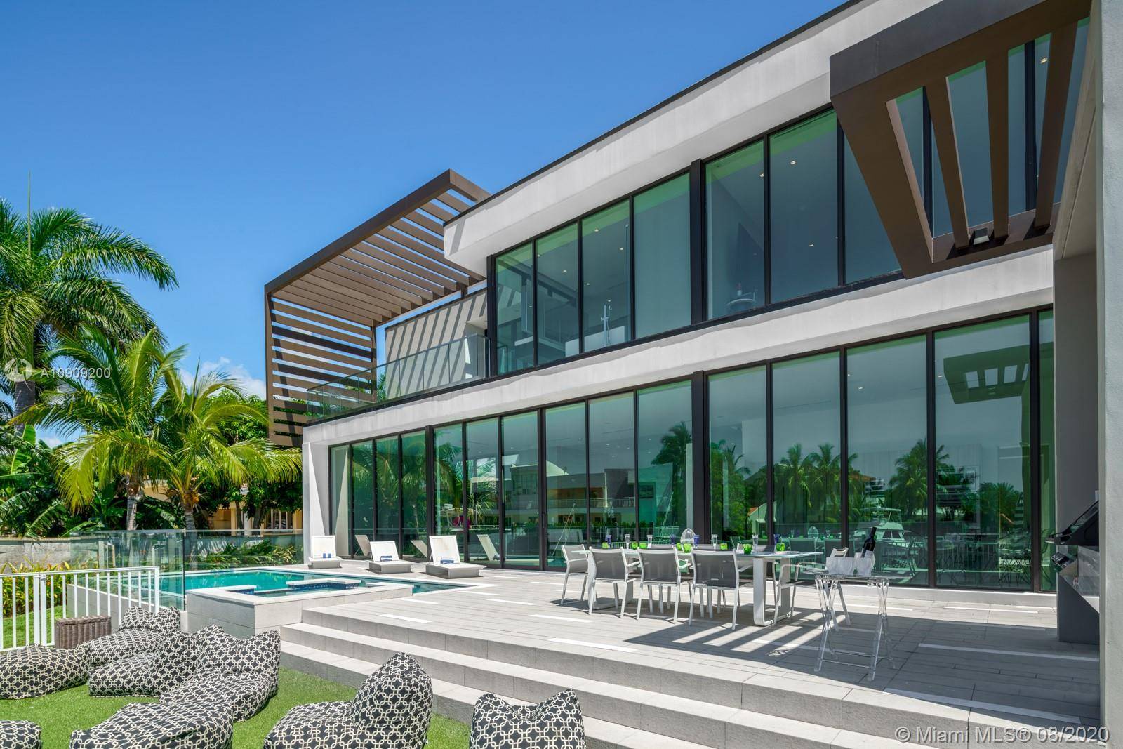 Exquisite semi gated eastern shores estate with yacht dockage, 80' of deep water frontage and unsurpassed wide water views !