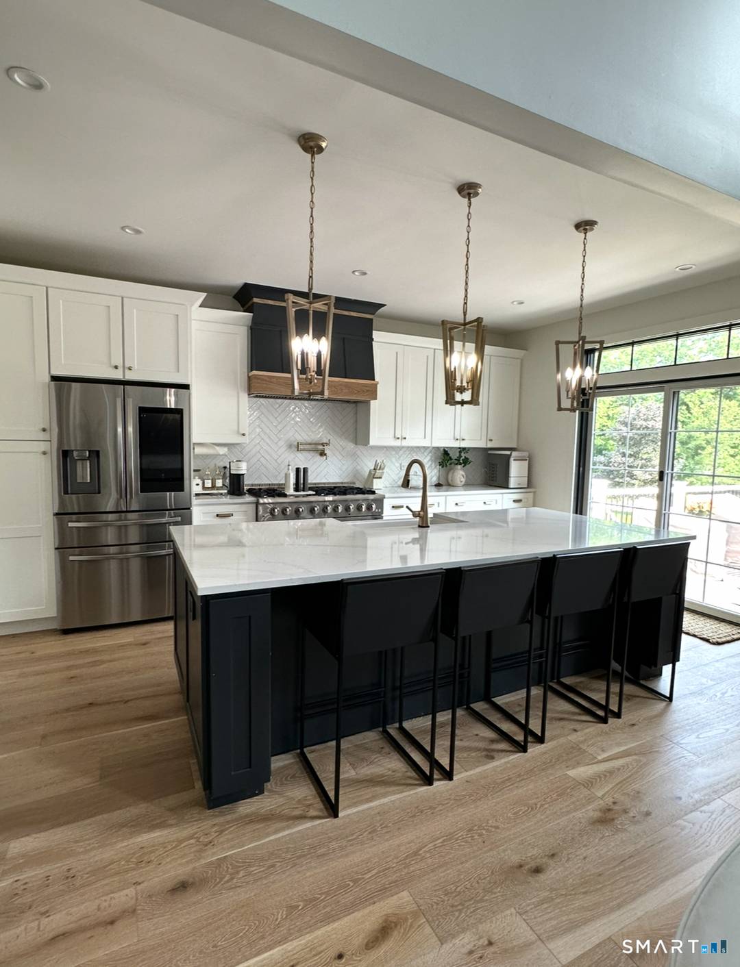 Stunning new construction ranch set on a beautiful level lot, just under an acre.