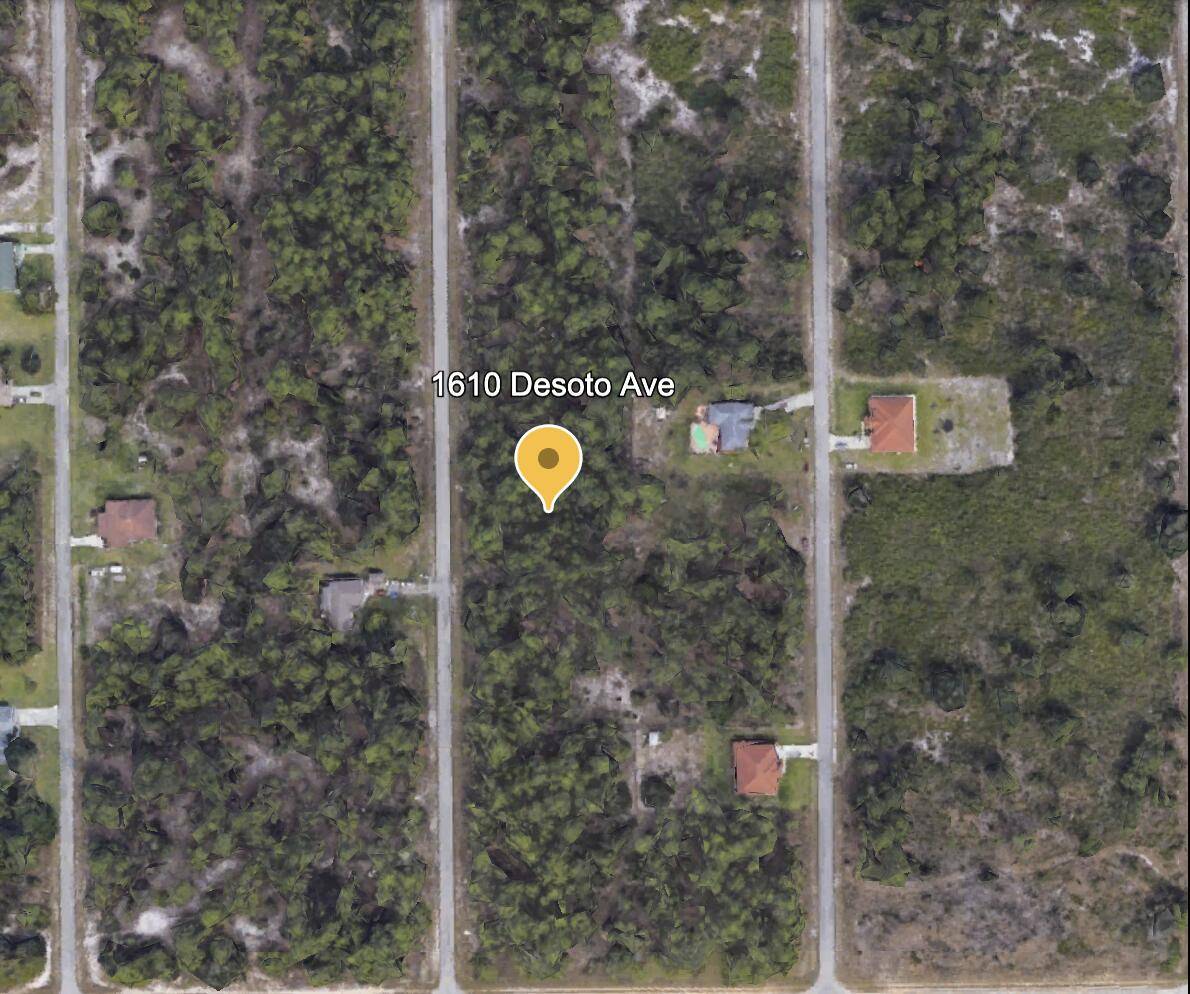 Half acre lot located in a quiet area of Lehigh, one of the fastest growing cities in Florida.