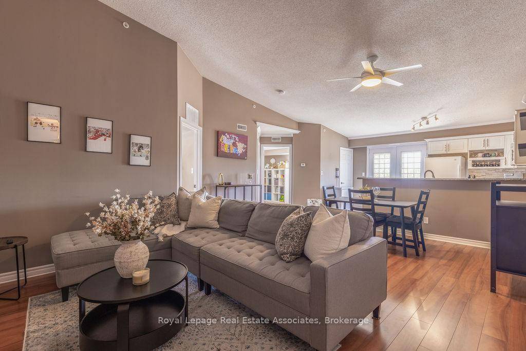 Welcome to 411 4003 Kilmer Drive, Burlington a bright and airy 2 bedroom, 2 bathroom condo that offers comfort and convenience in a prime location.